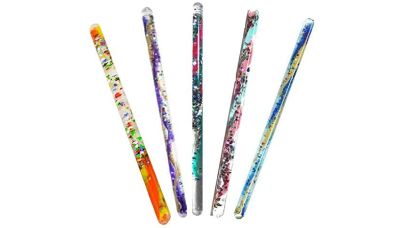4 glitter wands of different colors.