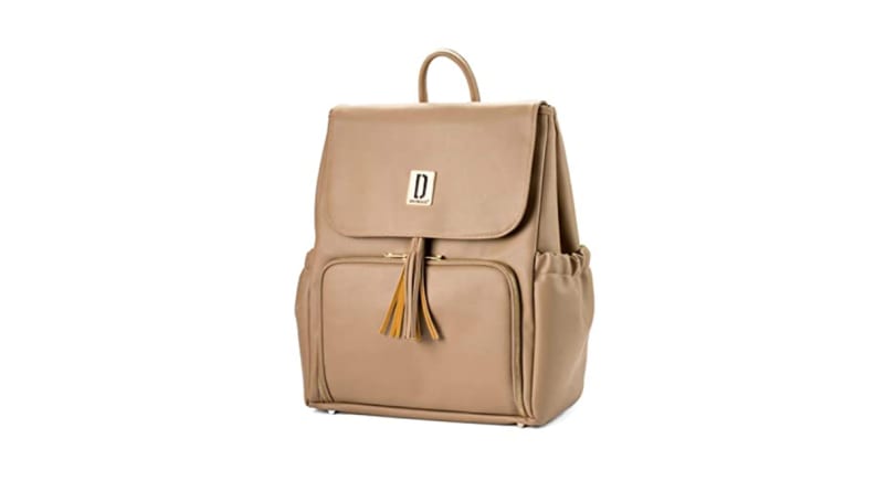 A stylish tan diaper bag with gold detailing.