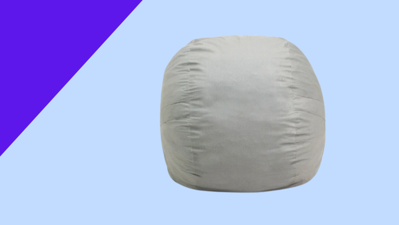 A gray bean bag on a blue background