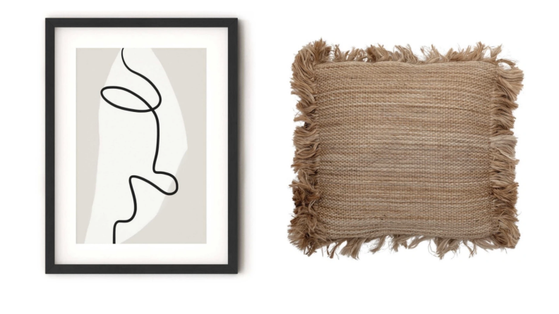 Abstract art print on the left, tan fringe pillow on the right