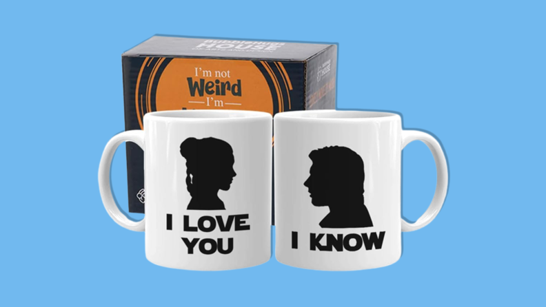 I Love You/I Know mugs on blue background.