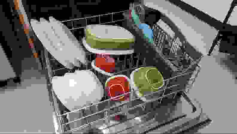 A close-up of the lower rack, which is stocked with clean dishes.