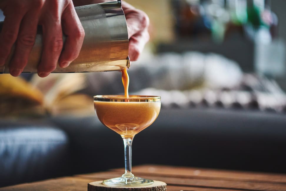 Pouring a cocktail from a shaker