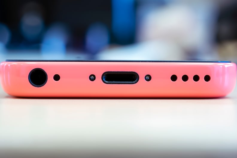 A photo of the Apple iPhone 5c's lightning port, speakers, and headphone jack.
