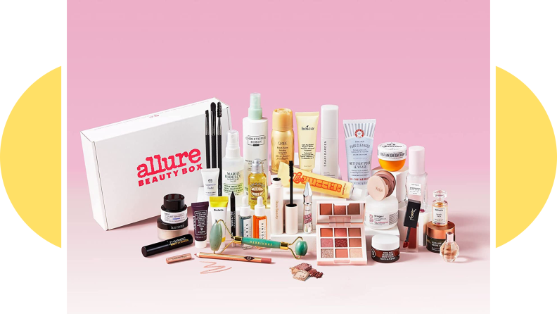 Allure Beauty Box with assorted beauty products and makeup beside it.