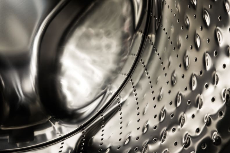 The steel bubbles on the side are how the WFW90HEFW cleans without destroying your clothes.