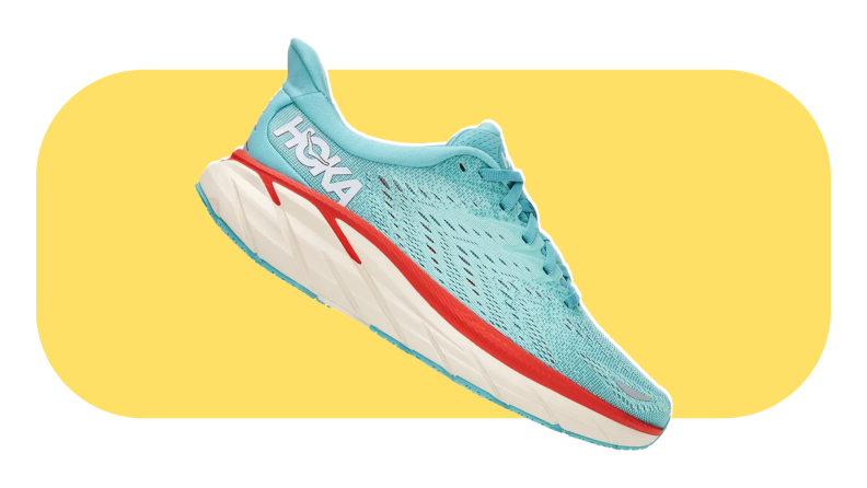 The Hoka Clifton 8 shoe in the color light blue and red on a yellow background.
