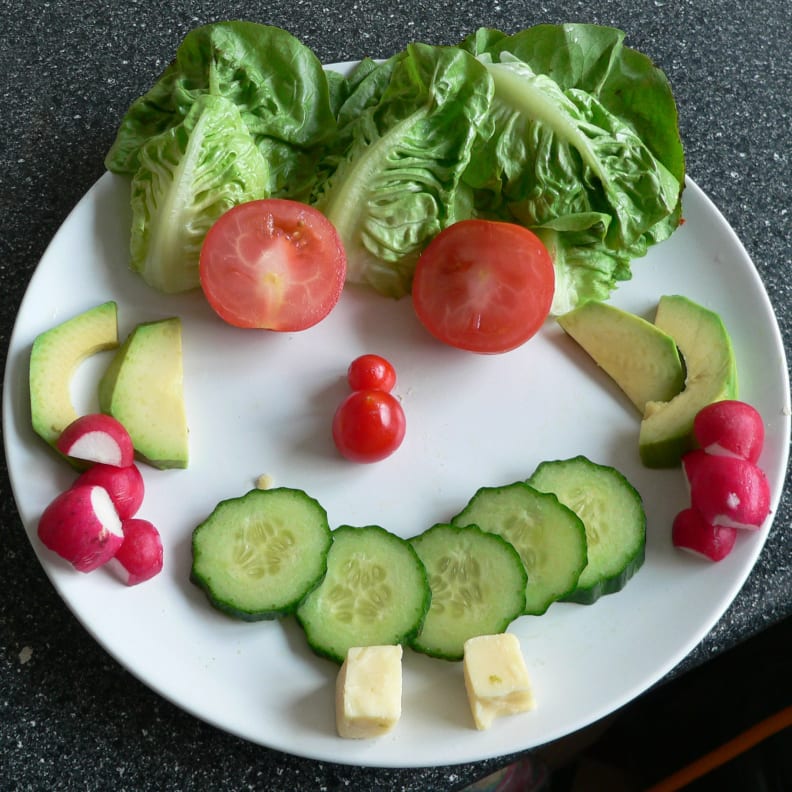 face made of veggie slices
