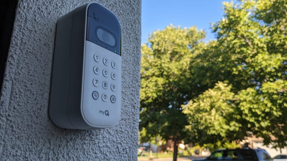 The MyQ Smart Garage Video Keypad mounted to an outside wall