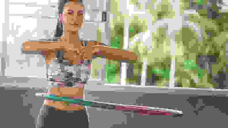 A woman using a hula hoop.