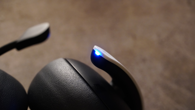 Close-up shot of the headset with a blue indicator light