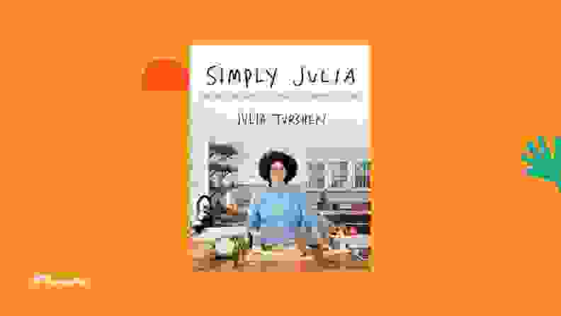 Simply Julia cookbook against a bright orange background.