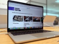 The Apple MacBook Air M4 13-inch laptop on a wooden desk