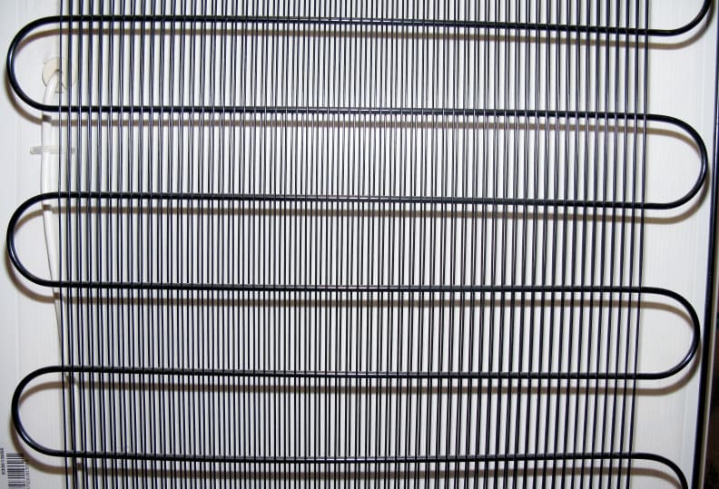 A typical fridge condenser unit