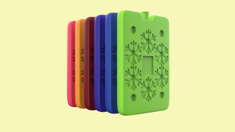 Colorful ice packs with a snowflake design are lined up on a yellow background.