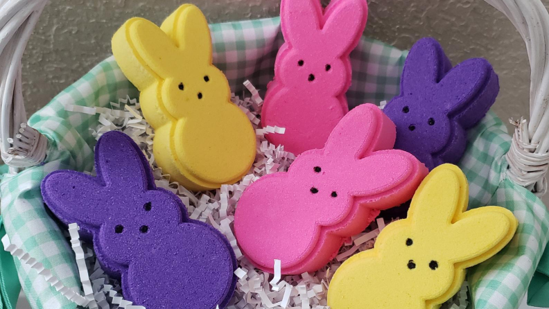 Basket full of Peeps bath bombs in yellow, purple, and pink