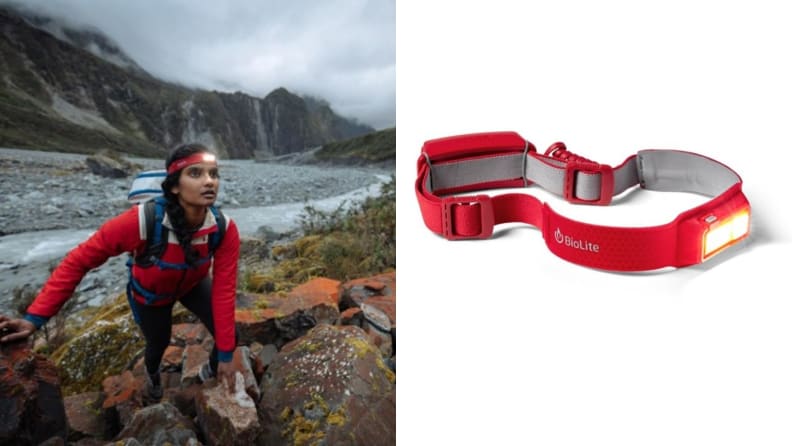 A hiker wears a red BioLite headband lamp while out hiking in nature.