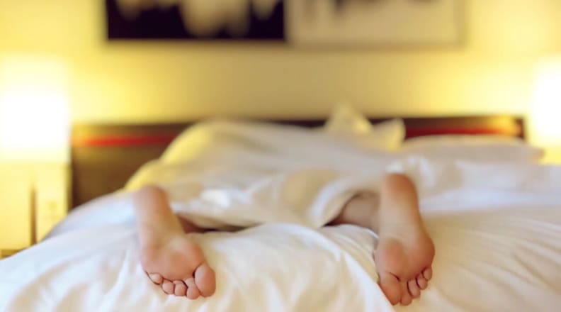 Person laying in bed