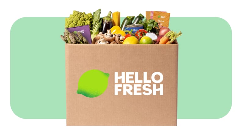 A box with the Hello Fresh logo and fresh food.