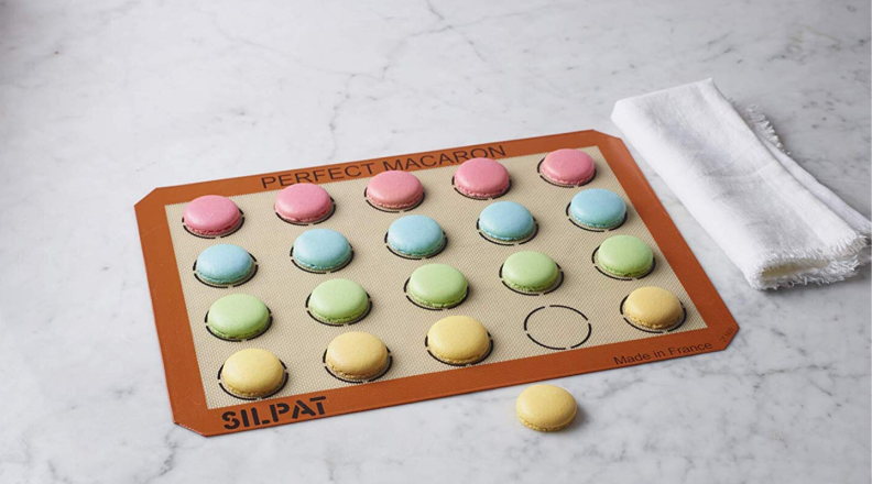 Colorful macarons on Silpat baking mat