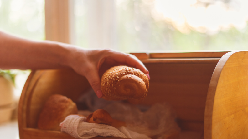 A bread box can give your loaves the most ideal environment: cool, dark, and humidity-controlled.