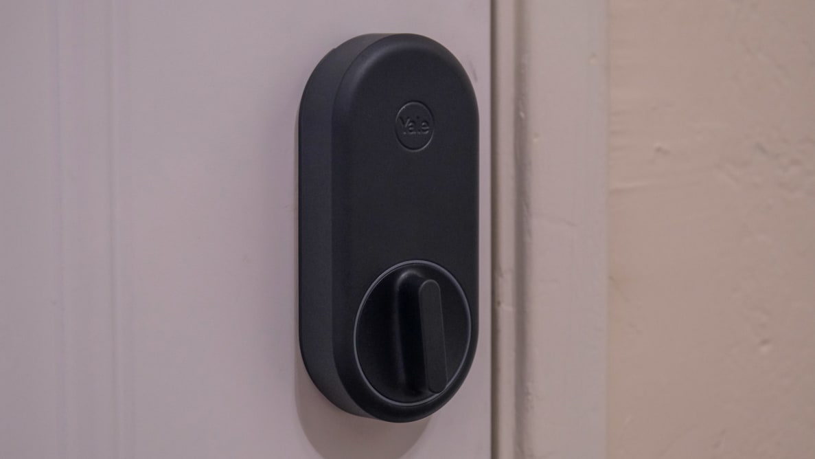 The Yale Approach smart lock mounted on a white door.