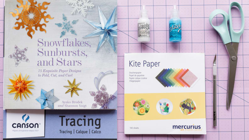 You only need a few craft supplies to make exquisite paper snowflakes.