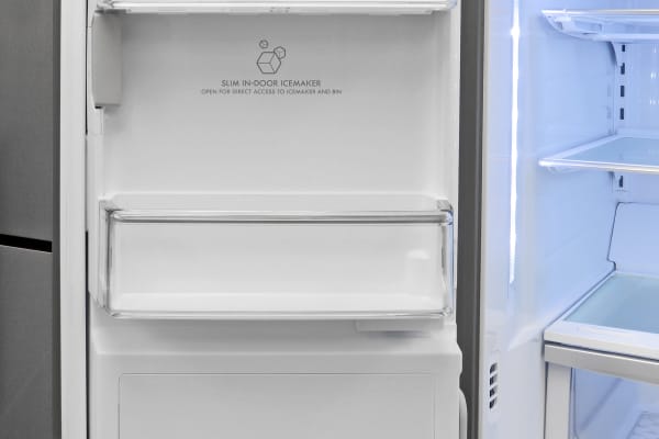 The Kenmore Elite 72483's left fridge door houses both the icemaker and the water filter.
