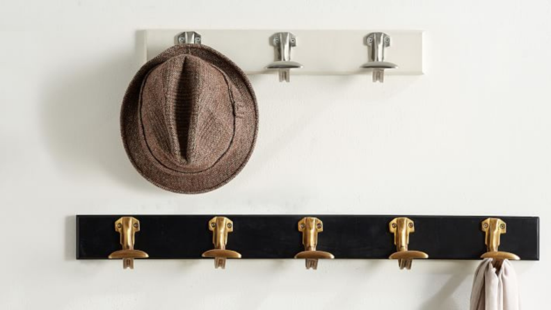 A wall hook rack is essential for hanging up coats that you wear daily, making it easy to grab on your way out.