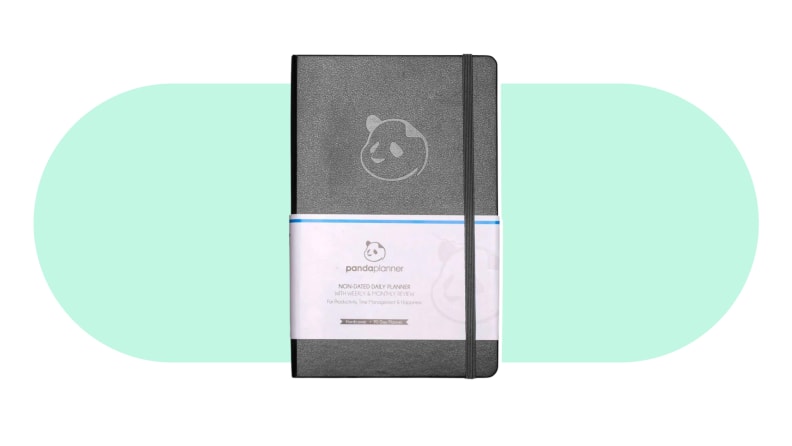 A Panda Planner with a gray cloth cover and panda printed on the front.