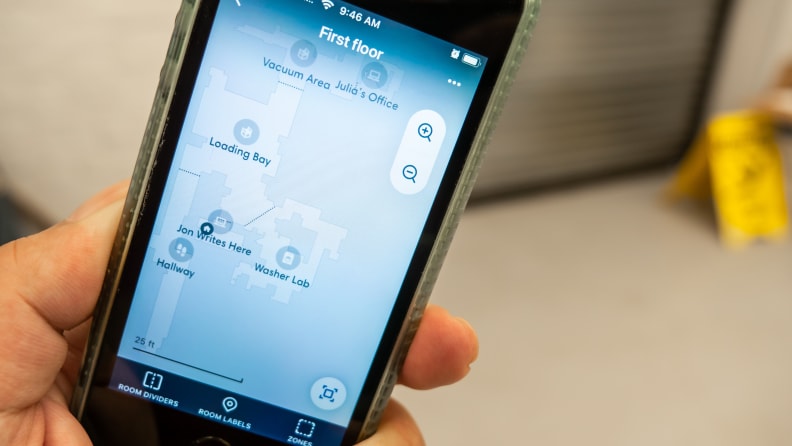 A cellphone with robot vacuum generated floor map