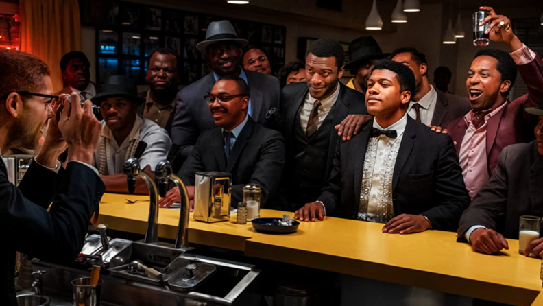 A still from the film One Night in Miami... featuring many of the characters in a bar.
