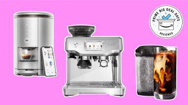 Three coffee makers against a pink background.
