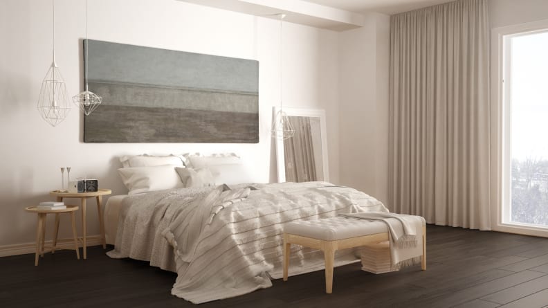 This neutral bedroom looks airy.