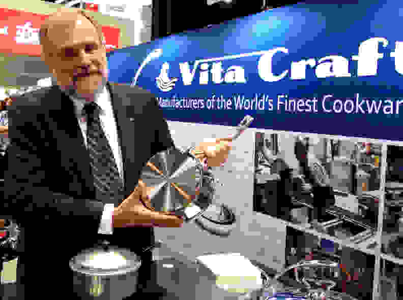 Vita-Craft president Gary Martin shows off the company's new Tyler Florence cookware.