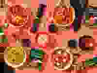 Banza new brown rice pasta dishes on pink background