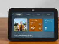 A black Amazon Echo Show 8 sits on a table.