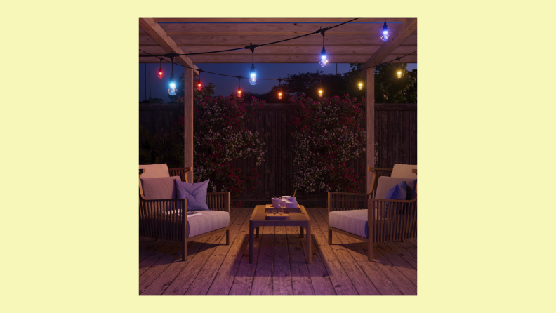 The image shows a model outdoor area with colorful lights.