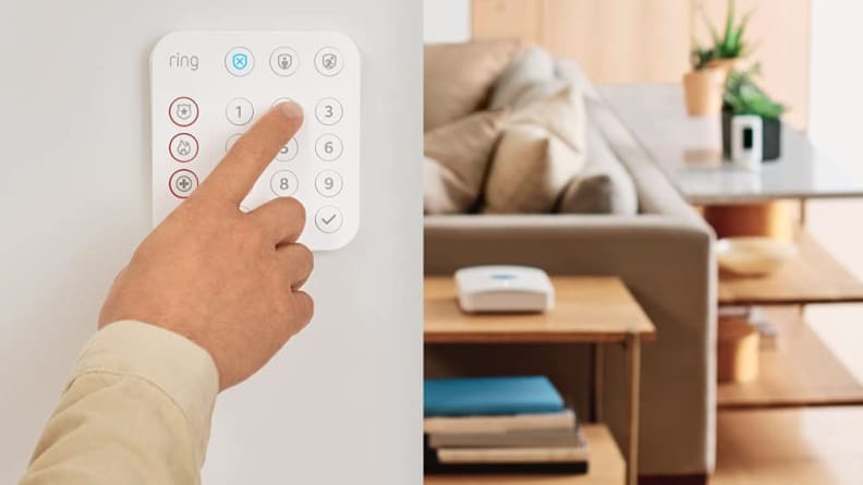 Person using touch keypad on alarm system mounted on wall in home.