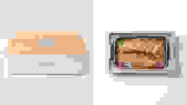 On left, Steambox product closed on a white background. On right, Steambox product open, with rice, veggie, and shrimp dish visible.
