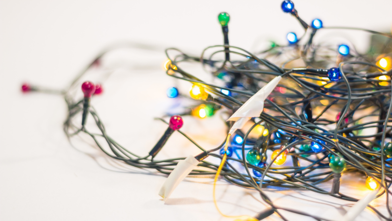 Tangled up christmas lights with some tape around them