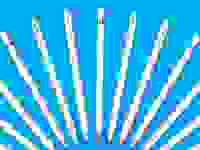 A row of Apple Pencils on a blue background.