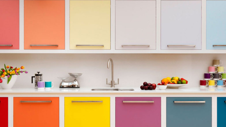 Multicolored vinyl cabinet liner in a kitchen.