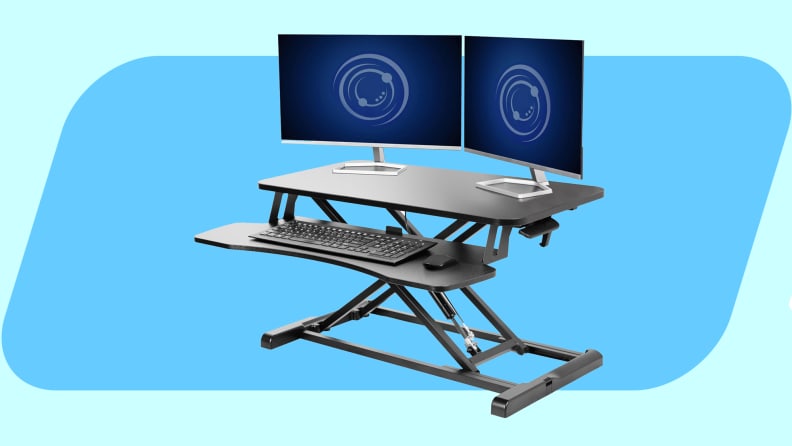 Vivo K Series standing desk converter on a blue background.