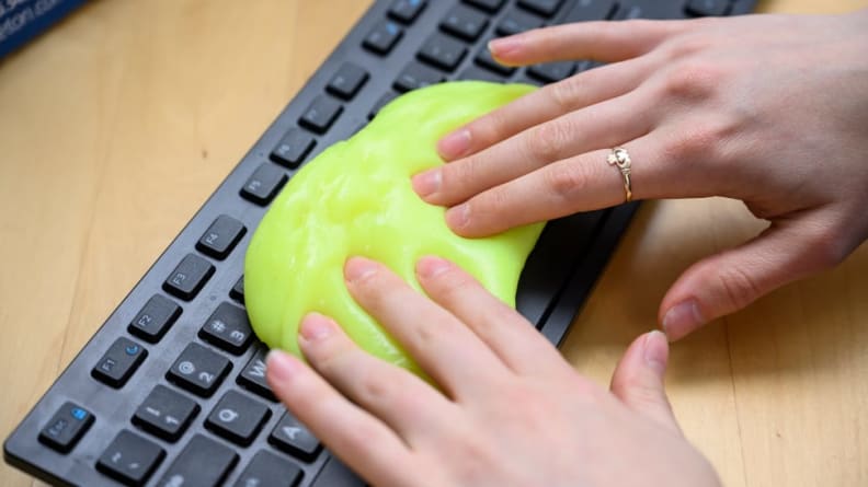 Yellow cleaning goo smushed on keyboard.