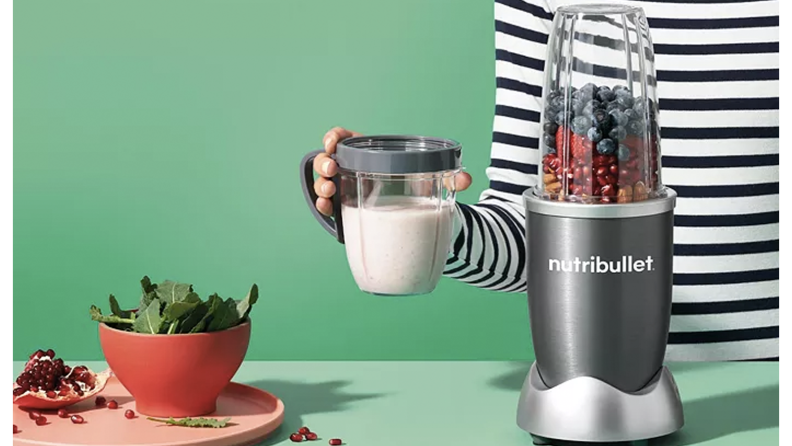 A NutriBullet blender on a counter