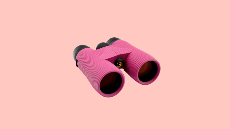 A pair of Nocs Provisions binoculars in pink.