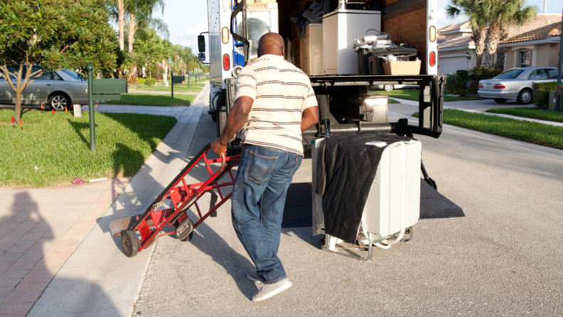 A dishwasher being delivered