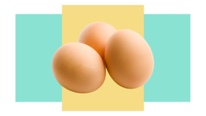 Three brown eggs against a blue and yellow background