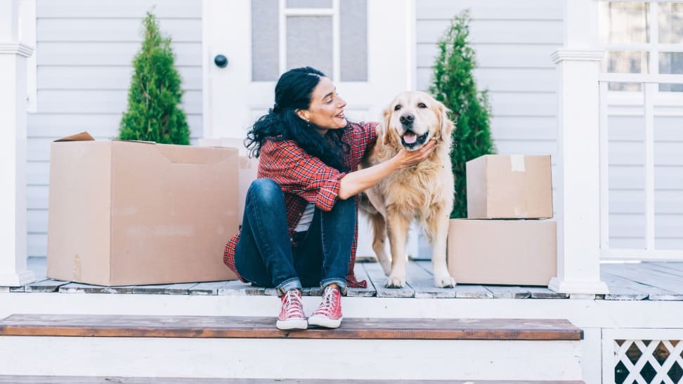 Woman moving into home financed with a first-time homebuyer program